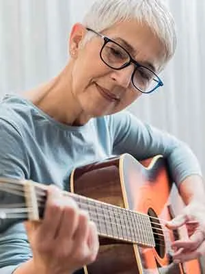 Woman playing guitar